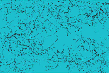 Black cracks covering cyan surface creating distressed texture background