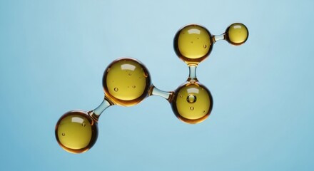 Golden oil molecules symbolizing scientific discovery and innovation in beauty and skincare