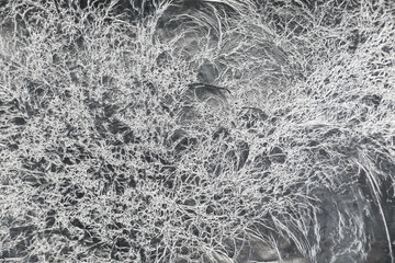 Crumpled aluminum foil as background, top view