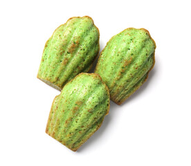 Tasty matcha madeleine cakes isolated on white, top view