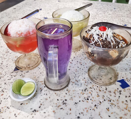 Purple tea and ice cream with fruits