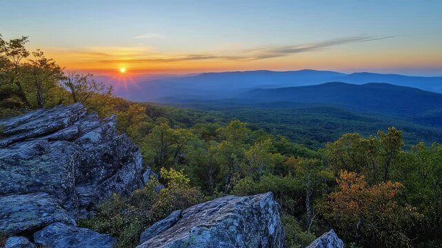 Stunning sunrise over the Blue Ridge Mountains and lush green forest