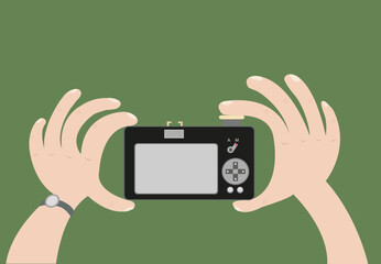 Hand holds and shoots a camera cartoon. Editable Clip Art.