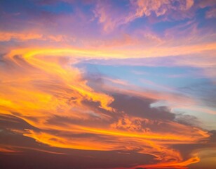 Fototapeta premium Vibrant Sunset Sky with Colorful Swirls of Orange and Purple Hues