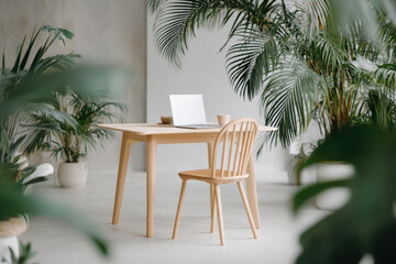 Fototapeta premium scandinavianstyle home office featuring sleek laptop surrounded by lush green plants
