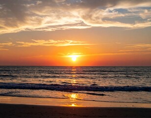 Obraz premium Serene Sunset Over Calm Ocean Waves With Beautiful Orange Sky