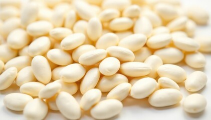 Close-up of white beans on pristine white background, raw, background