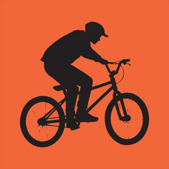 Obraz premium Silhouette of a person riding a bicycle on orange background