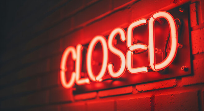 Neon sign with the word "CLOSED" illuminated in red. The sign is mounted on a brick wall, giving it a simple and direct appearance. The glow of the neon lights creates a warm ambience. - Powered by Adobe