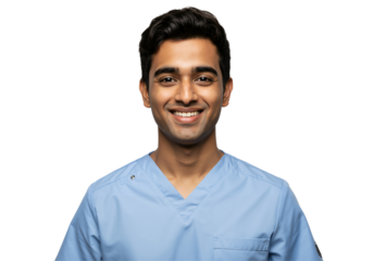 Young Indian male doctor or nurse in blue scrubs smiling confidently at the camera. Healthcare professional portrait on a transparent background. Medical worker ready for work.