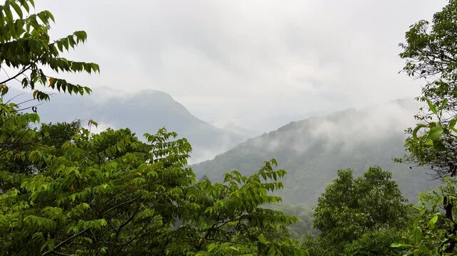 View of cloud moving over mountain