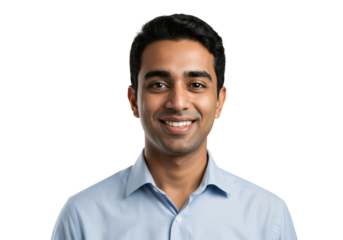 Young Indian man smiling confidently in a light blue collared shirt. Professional headshot portrait of a happy South Asian male against a transparent background. Cheerful adult looking at camera.