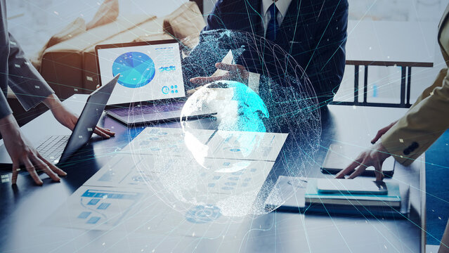 Group of business people meeting and global network concept. Wide angle visual for banners or advertisements.