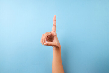 Letter D in American Sign Language Over Blue Background
