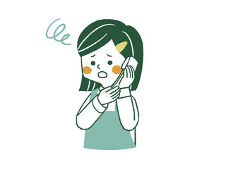困った表情の電話で話しているエプロンを着用した女性