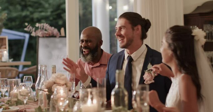 Diverse wedding party members laughing at toast, tasting dessert, signing notebook at reception