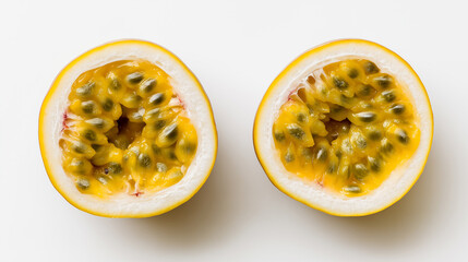 Halved passion fruits with yellow pulp and black seeds arranged in a row on a white background.
