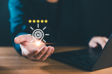 Hand holds a glowing AI lightbulb with five stars, Concept of AI (Artificial Intelligence)...
