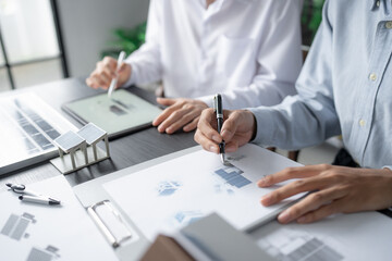 Solar panels green energy Business man working green eco friendly office business creative idea Planing Bio economy for business eco friendly professional Engineer sustainable electricity.