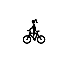 Obraz premium Female cyclist riding a bike in black and white, urban mobility