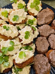 pate sandwiches on a blue plate