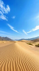Fototapeta premium Serene Desert Landscape with Rippling Sand Dunes and Blue Sky