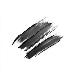 Abstract black brush strokes on a white canvas background, perfect for creative designs.