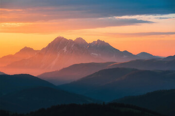 Vibrant sunset over majestic mountain range