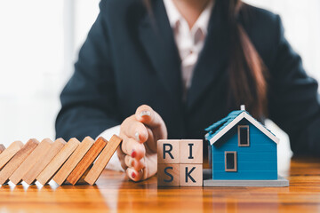 Home insurance and security concept. Real estate house insurance. Domino chain challenge risk. insurance risk management, property security, financial planning to safety, mortgage protect investment