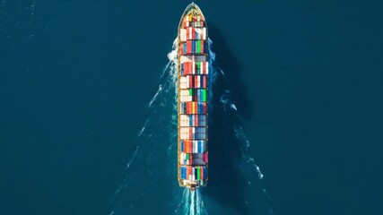 Large cargo ship sailing on ocean - Powered by Adobe