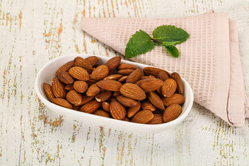 Tasty ripe almond nuts heap