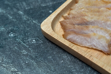 Salted Pork Neck on Wooden Tray