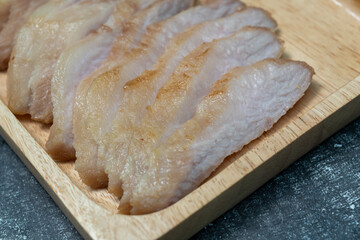 Salted Pork Neck on Wooden Tray