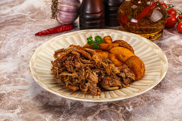 Baked shredded pork with potato