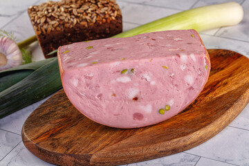 Italian Mortadella pork sausage piece
