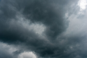 Overcast sky with dark rain cloud in windy day.
