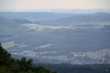 Fog over trees and village in Bavaria