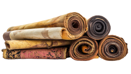 Four rolled textiles, aged and patterned, display varying shades of brown, beige, and pink, suggesting antique rugs or tapestries