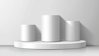 Three white cylinders on a white pedestal