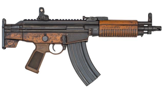 Weathered assault rifle with wood and polymer furniture, a curved magazine, and a small optic mounted on the top rail