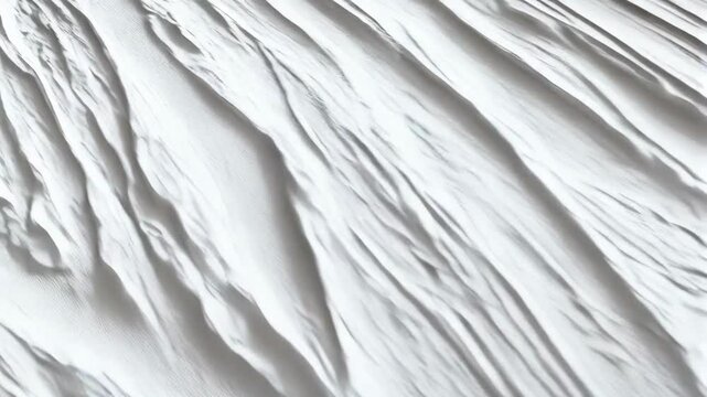 Abstract view of sharp white ridges and formations creating depth and texture in a monochromatic landscape for background pattern.