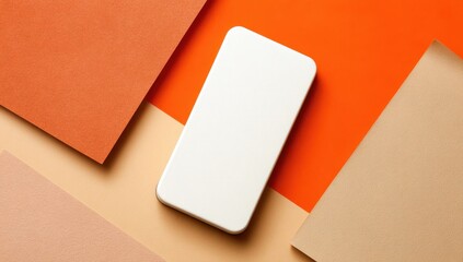 White smartphone on a colorful geometric background