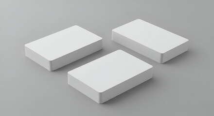 Stacks of blank business cards arranged on a neutral background, highlighting the clean, uncluttered design and showcasing ready-to-print business cards for marketing and branding projects.