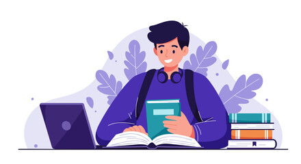 Young man reading book while studying at desk with laptop  