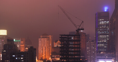 Shanghai, China. Development Residential Building. Shanghai Waitan Residential District. Urban Skyline In Evening Time. Night Illumination. Business District. City Business Center. Smog Over City