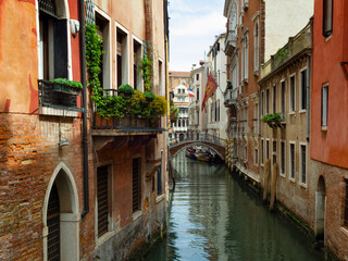 Venice. View of the channel, city buildings and bridges over the canal. 
