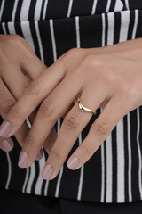 golden finger ring for women isolated image