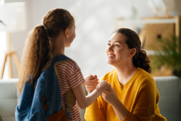 Happy family preparing for school