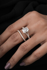 woman elegant finger ring with white diamond 