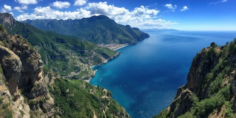 Panoramic view of a Mediterranean coastline with dramatic cliffs and lush greenery